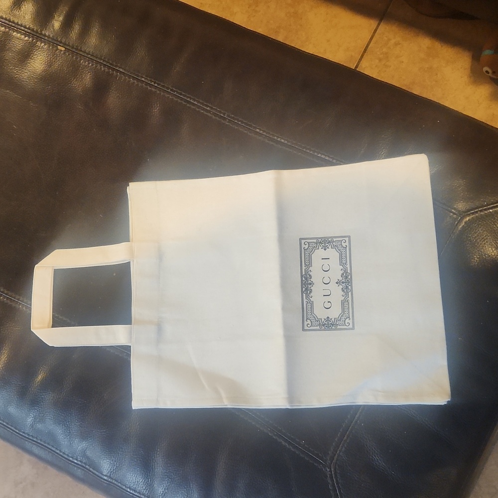 Gucci handle gift/dust bag. Never used.